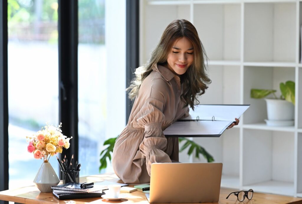 A smiling student during a Zoom Hebrew Lessons Online with Anat Migdalor, studying online from home.