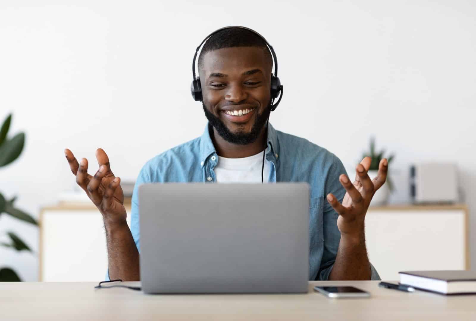 Online Hebrew lesson with a smiling student improving fluency in Hebrew through virtual learning.